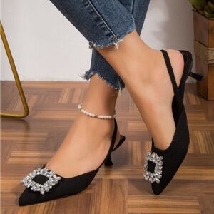 Black pointed toe heels